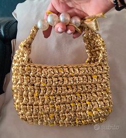 borsa piccola in fettuccia oro
