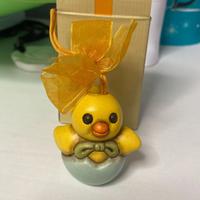 Addobbo pasquale pulcino con uovo
