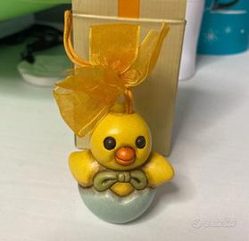 Addobbo pasquale pulcino con uovo