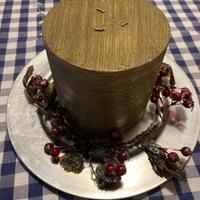 Centrotavola con candela dorata