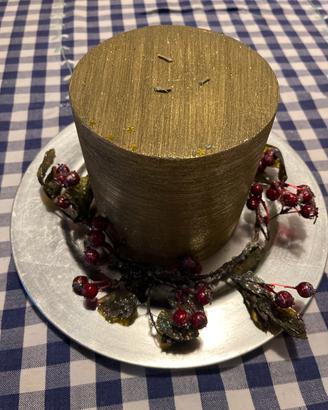 Centrotavola con candela dorata
