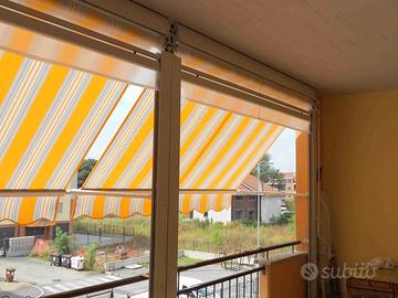Tende anti vento a doppio rullo con tenda da sole