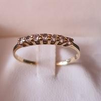 Anello in oro giallo 750  veretta con diamantini