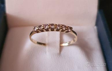 Anello in oro giallo 750  veretta con diamantini