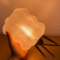 Lampada/abat-jour di design con luce calda soffusa