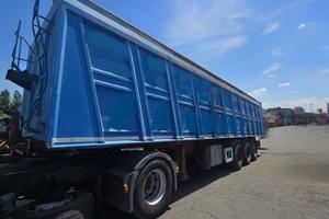 Semirimorchio ribaltabile posteriore per rottami