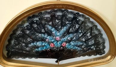 cornice in legno con ventaglio 