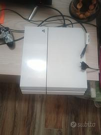 ps4 con giochi e joystick 