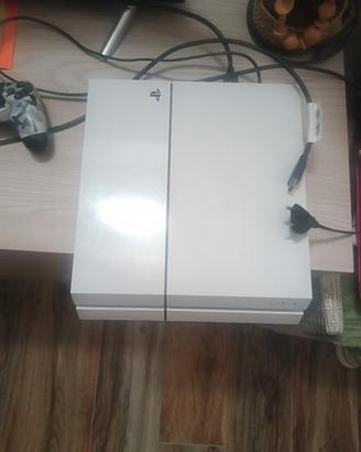 ps4 con giochi e joystick 