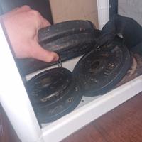 32 kg dischi in ghisa piú 2 manubri