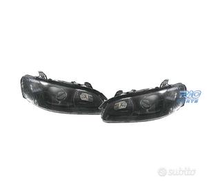 FARI PER OPEL OMEGA 94-99 LENTE A LENTE NERA
