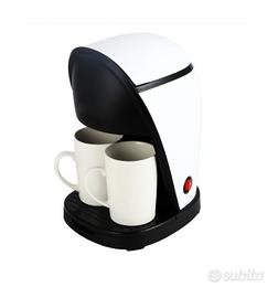 macchina da caffè con due tazze in ceramica