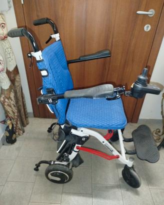 Sedia a rotelle elettrica
