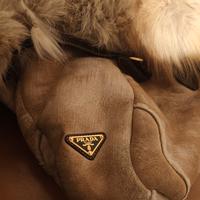 borse e portafogl originali di Prada con sacchetti