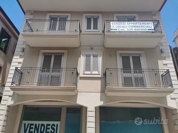 Appartamento e locale commerciale nuova costruzion