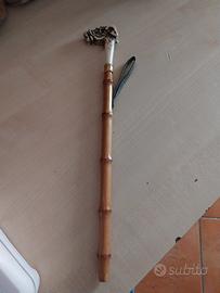 bastone corto con testa di animale 