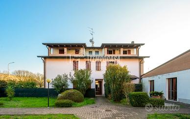 TRILOCALE CON GIARDINO