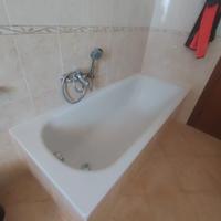 vasca da bagno e congelatore a pozzo