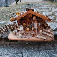 casetta in legno montagna con animali
