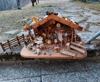 casetta in legno montagna con animali