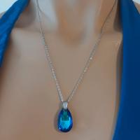 Collana acciaio nuova con ciondolo blu luccicante 