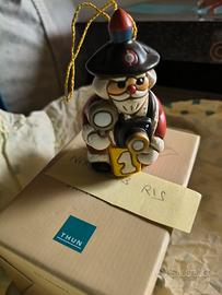 carabiniere thun con macchina fotografica