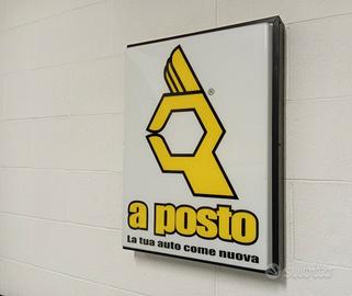 Insegna Officina a posto