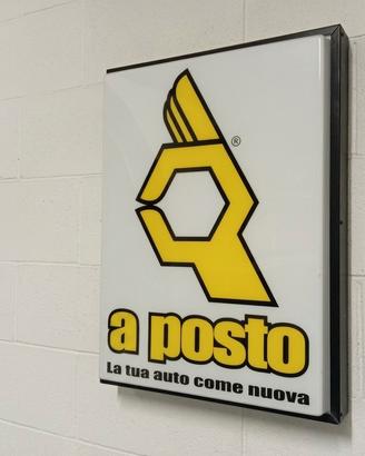 Insegna Officina a posto