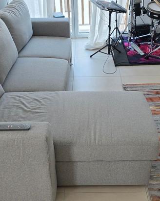 Divano letto con chaise-long e contenitore