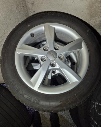  4 cerchi in lega usati peAudi a 3 con gomme neve 