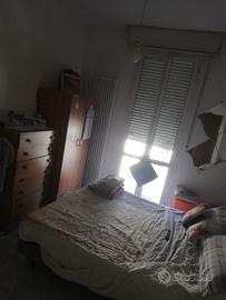 Singola con balcone in trilocale