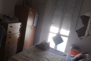 Singola con balcone in trilocale