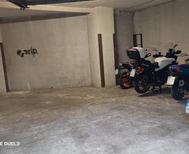 Posto moto in box
