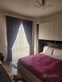 Camere arredate con balcone e aria cond