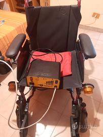 Sedia a rotelle elettrica