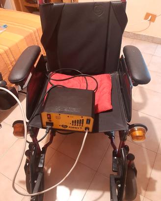 Sedia a rotelle elettrica