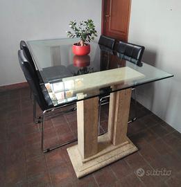 Tavolo in cristallo con base in marmo travertino