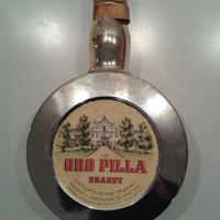 Bottiglia brandy oro pilla (orologio) oro