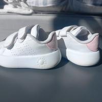 scarpe adidas bianche con strappi