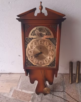 Orologio a pendolo da muro