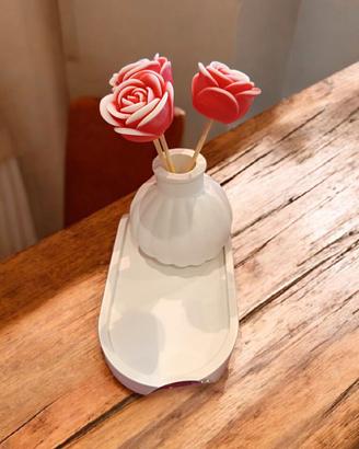 vaso in gesso con candele- bomboniere