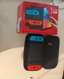 Console Nintendo switch oled+scatola da viaggio