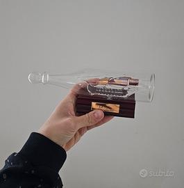 Nave in bottiglia "La Niña" su supporto in legno