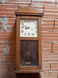 Orologio a pendolo da parete