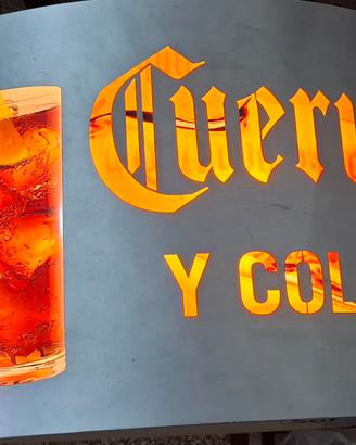 insegna luminosa CUERVO Y COLA