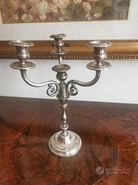 candelabro in ottone argentato. 