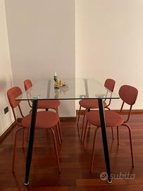 Tavolo SKLUM con piano in vetro