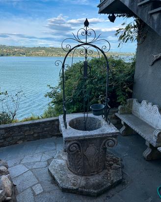 Pozzo decorativo da giardino in pietra