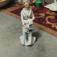 statuetta porcellana difettata