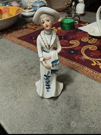 statuetta porcellana difettata